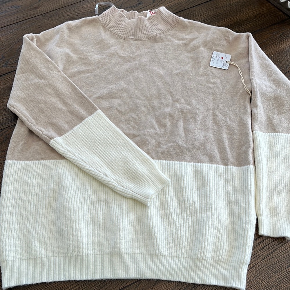 Half tan half cream turtle neck sweater